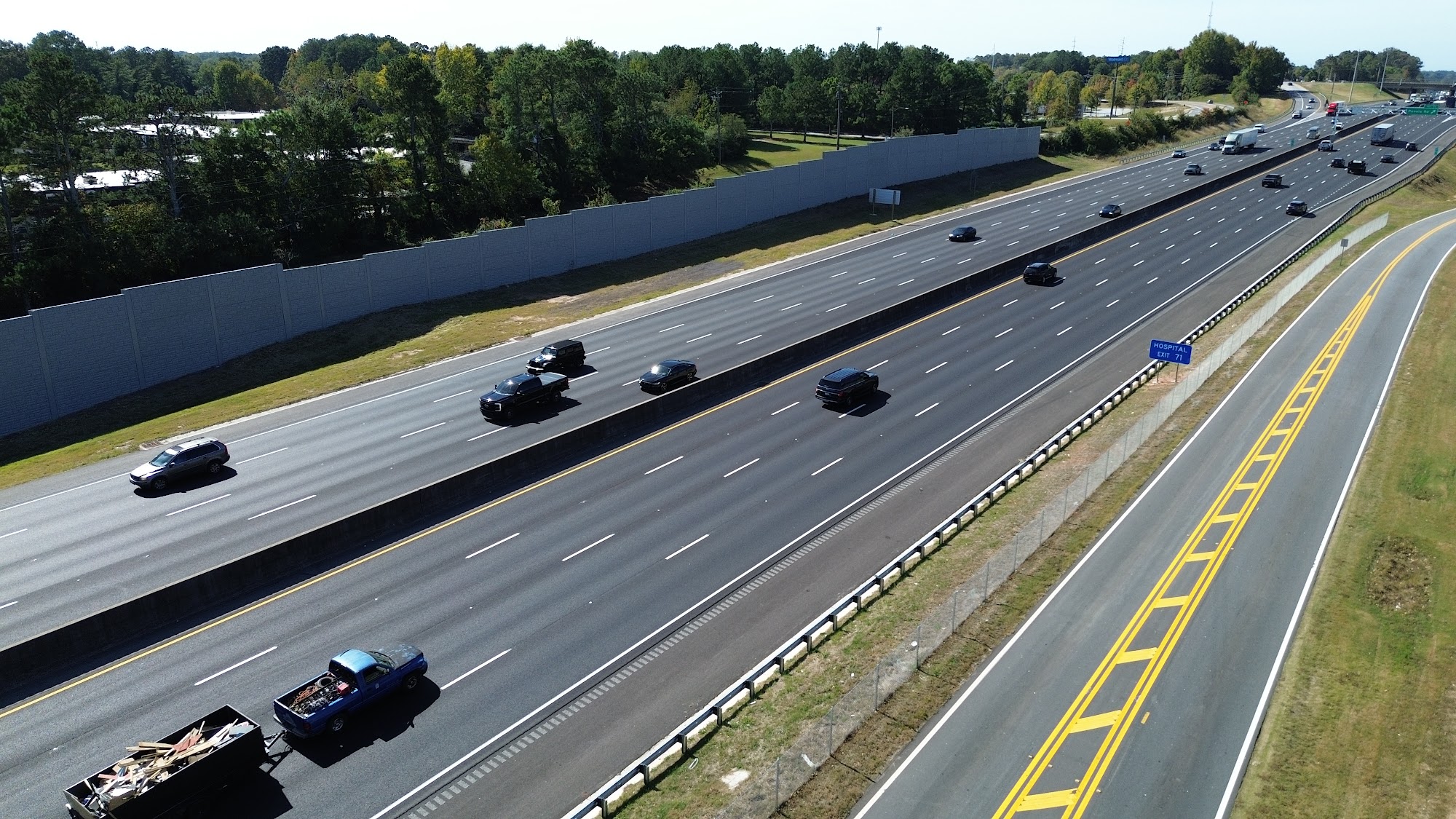 Sound wall running along the interstate at the I-285/I-20 East Interchange